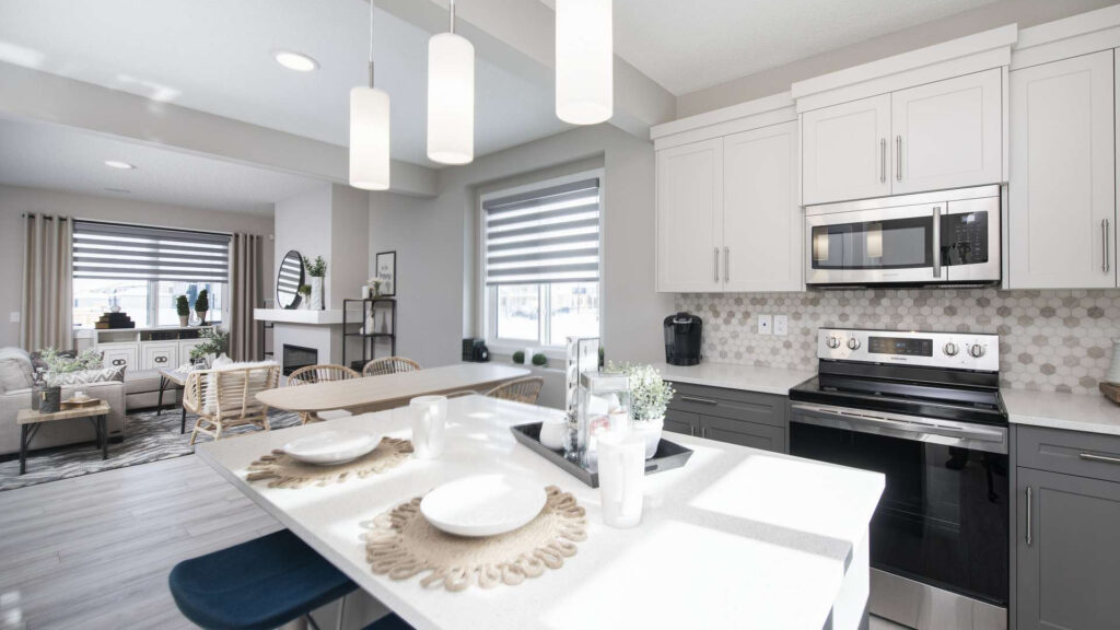 The interior kitchen, dining, and living space in a townhome.