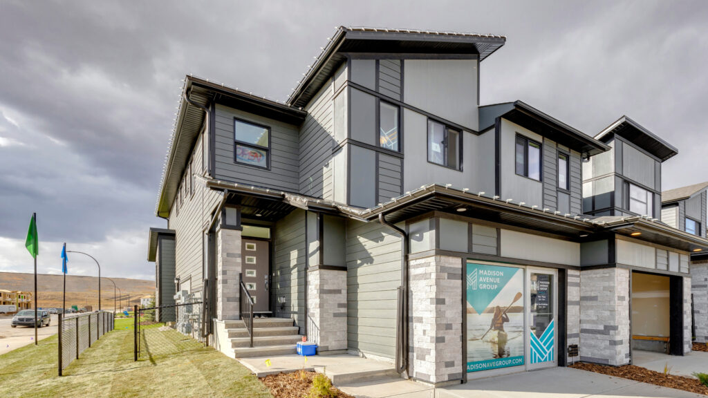 new madison avenue townhouse showhome in wolf willow, calgary, alberta