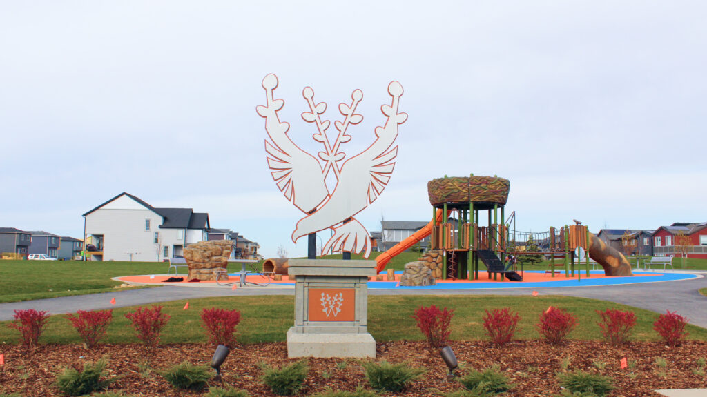 osprey park sign and playground in wolf willow