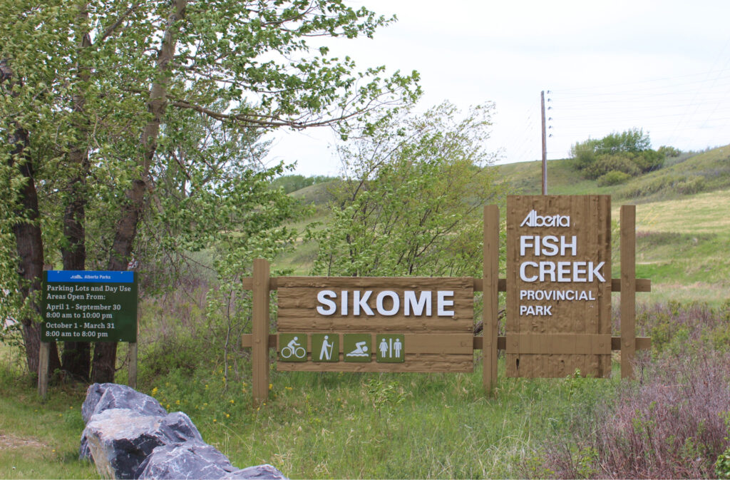 sign near the opening of sikome lake in fish creek park