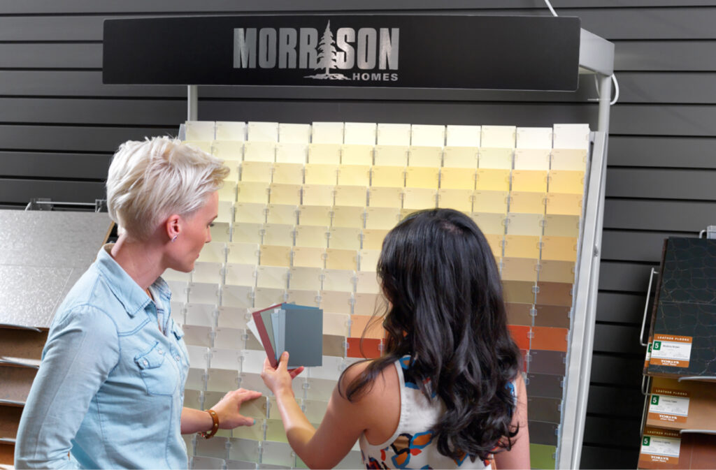 two people picking out paint chips at the morrison selection studio