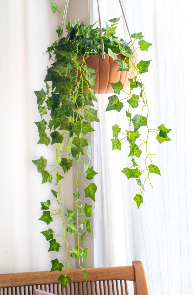 hanging planter made from an artificial pumpking
